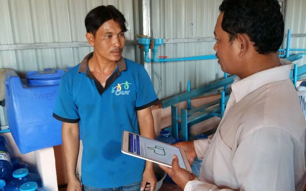 Teuk Saat 1001 water kiosk operator in rural Cambodia