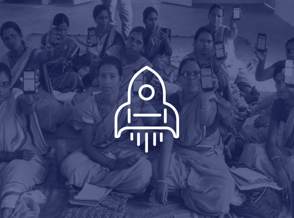 Frontline health workers holding phones running CommCare