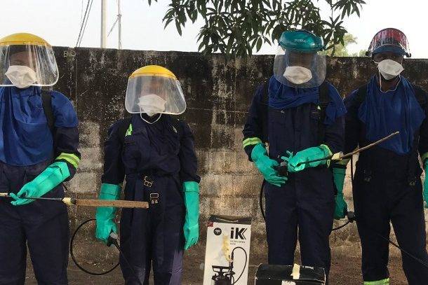 An indoor residual spraying team on an Abt Associates VectorLink malaria campaign that runs on CommCare