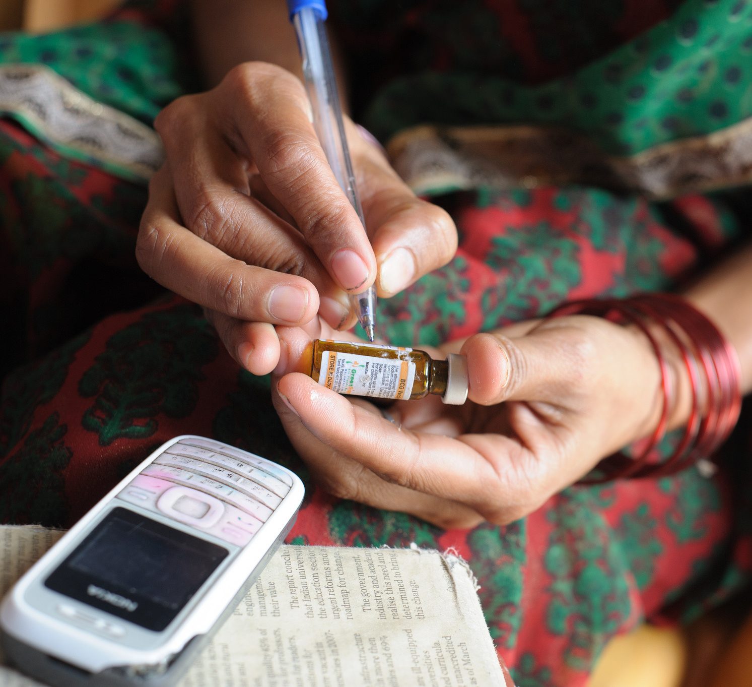 Woman in India logging medicine in CommCare