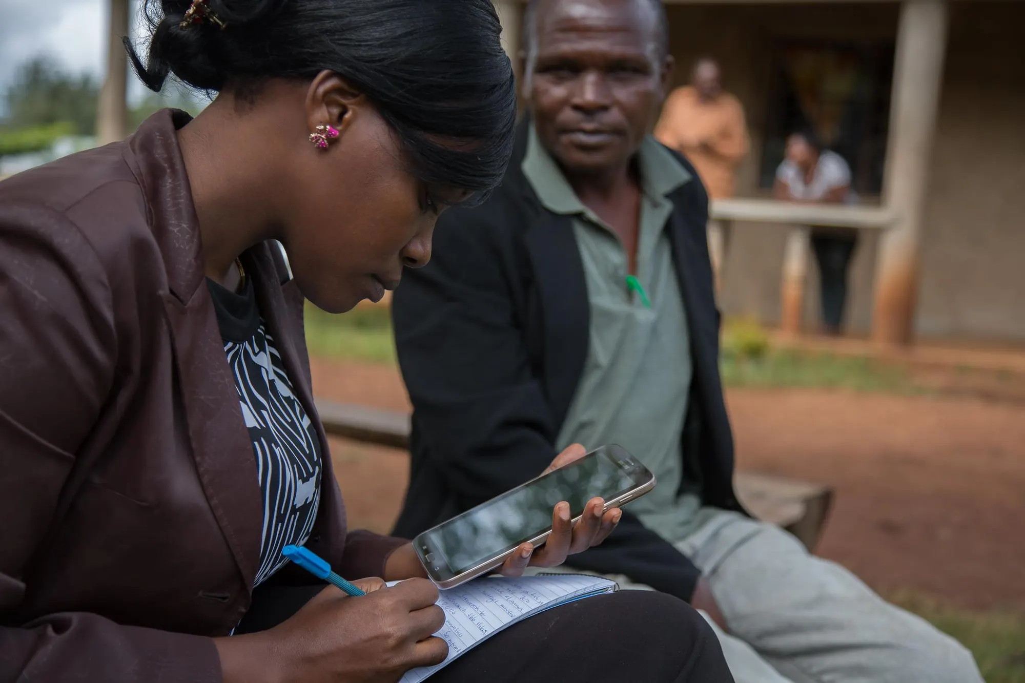 A community health worker using CommCare on a tablet