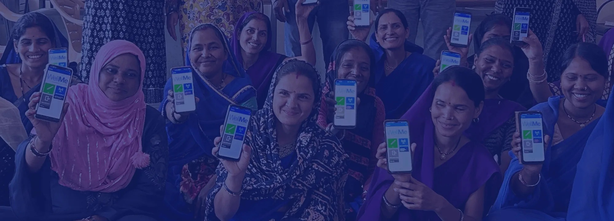 Frontline Workers holding phones running the WellMe application